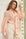 STYLEVAVA orange floral balloon sleeve blouse with tie-neck, model wearing size S
